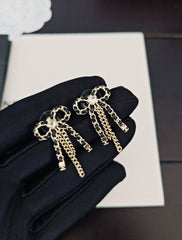Black Leather Bow Tassel Earrings
