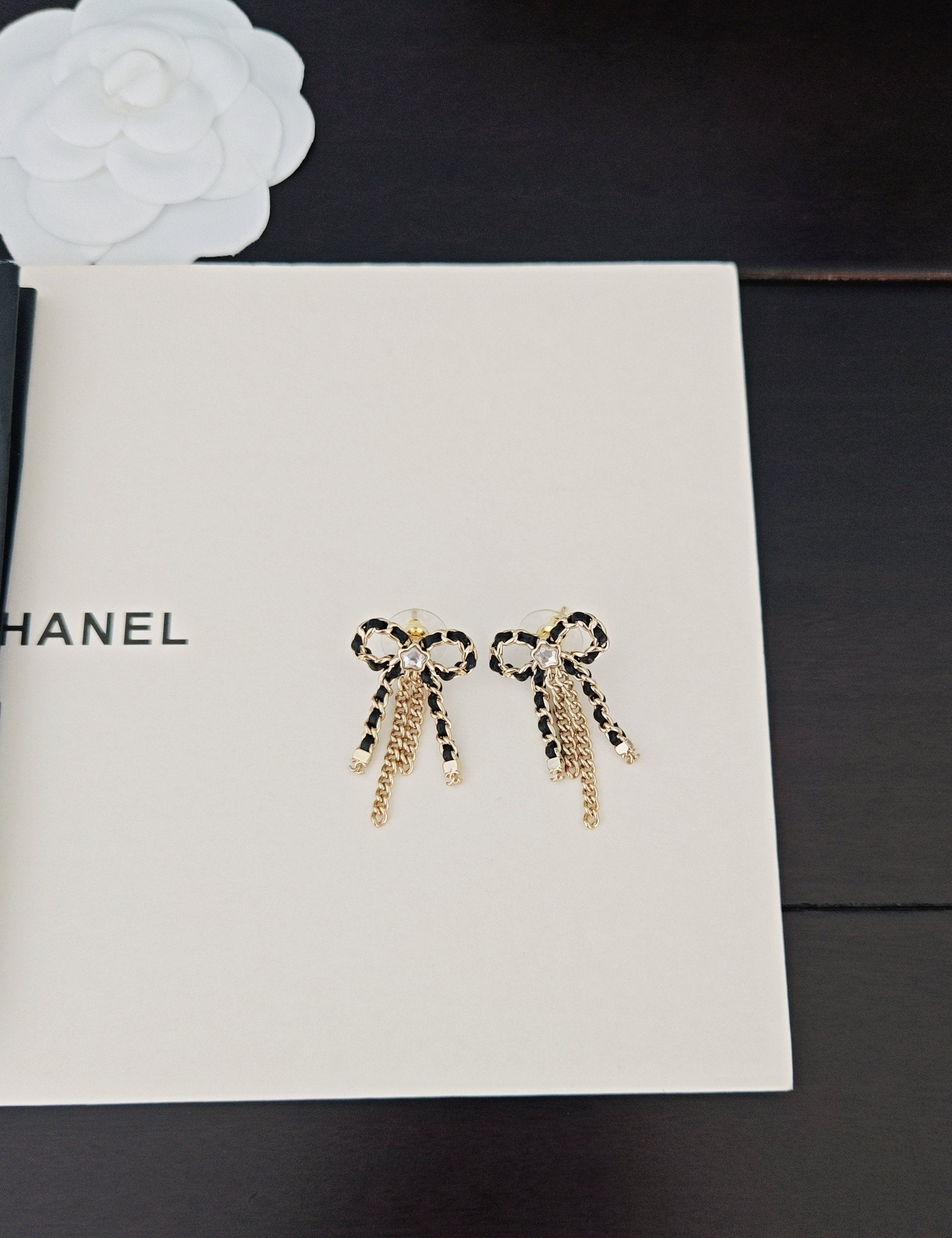 Black Leather Bow Tassel Earrings