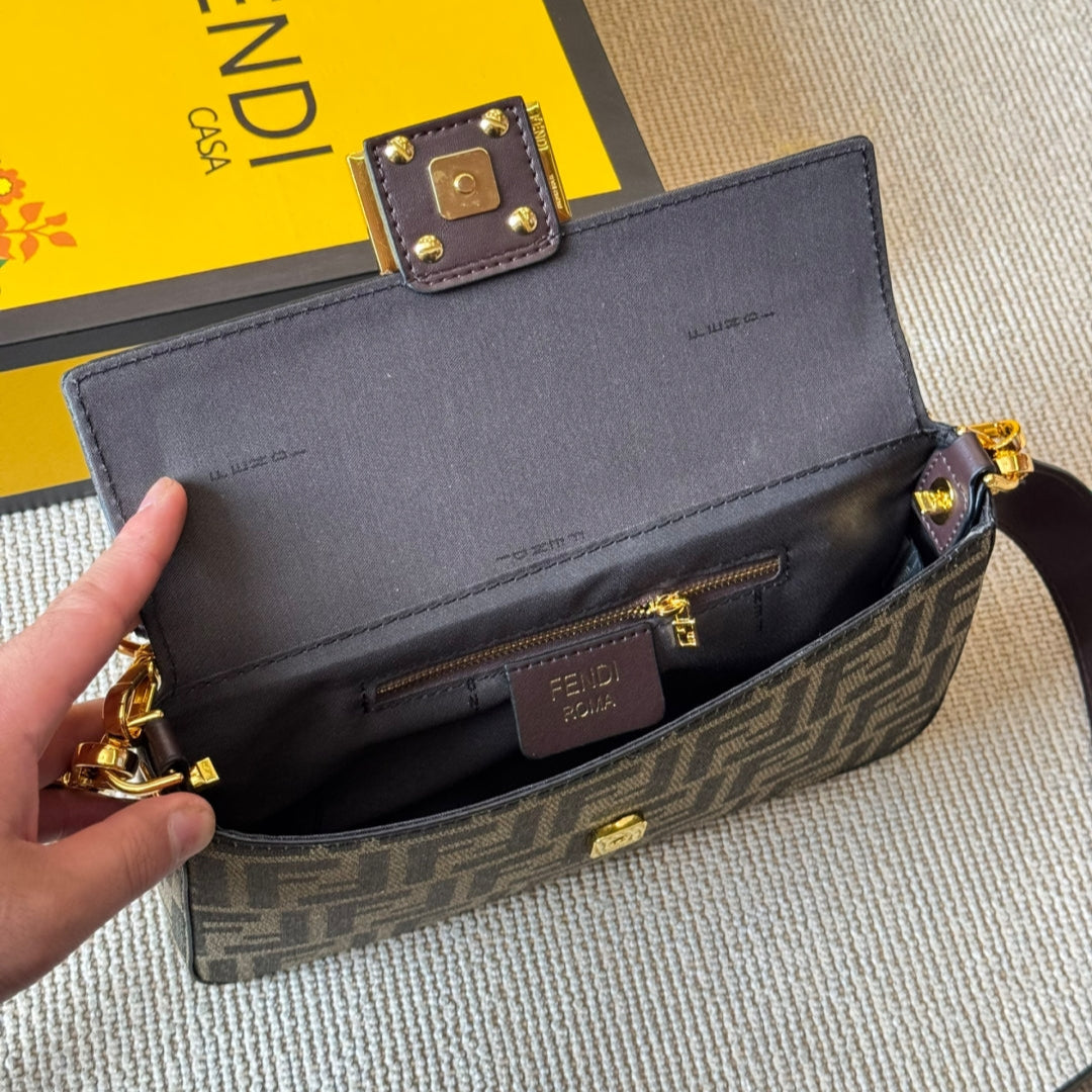 Vintage embossed metal buckle baguette bag
