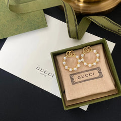 Pearl circle drop earrings