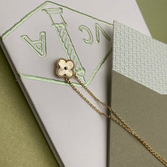 Gold and Silver Four-Leaf Clover Necklace