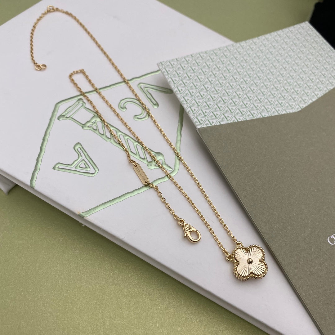 Gold and Silver Four-Leaf Clover Necklace