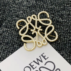 Versatile Gold Monogram Diamond Brooch
