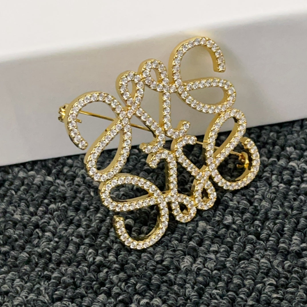 Versatile Gold Monogram Diamond Brooch