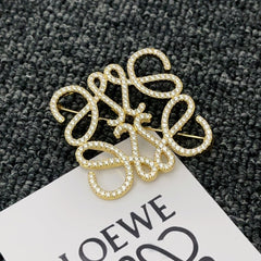 Versatile Gold Monogram Diamond Brooch