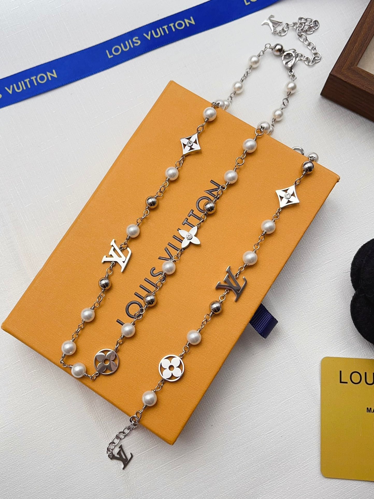 Classic pearl charms bracelet and necklace