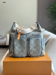Embossed denim pocket messenger bag