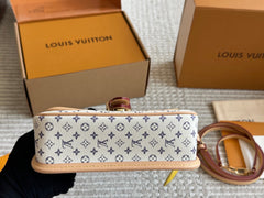 Leather embossed flap handbag