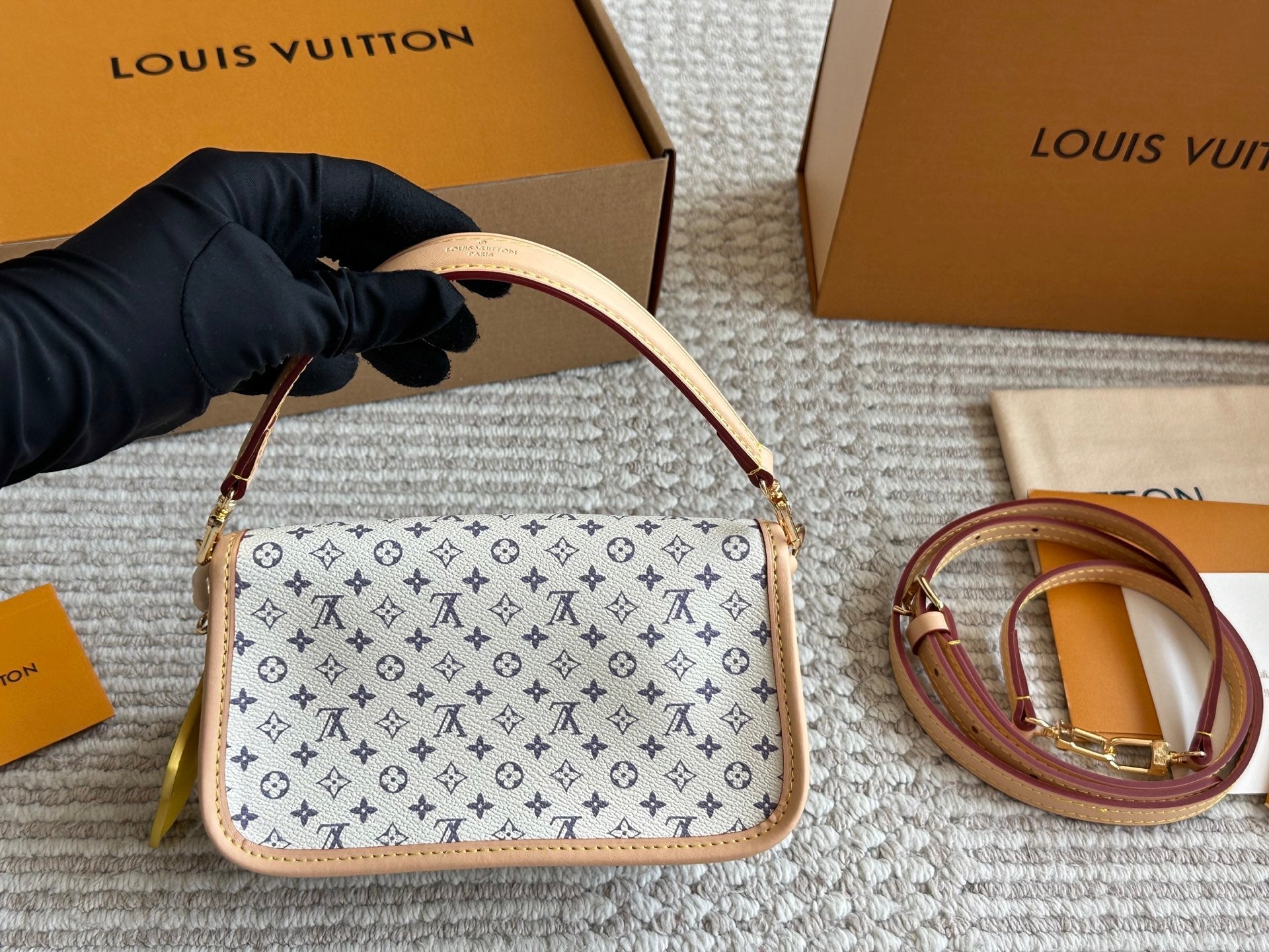 Leather embossed flap handbag