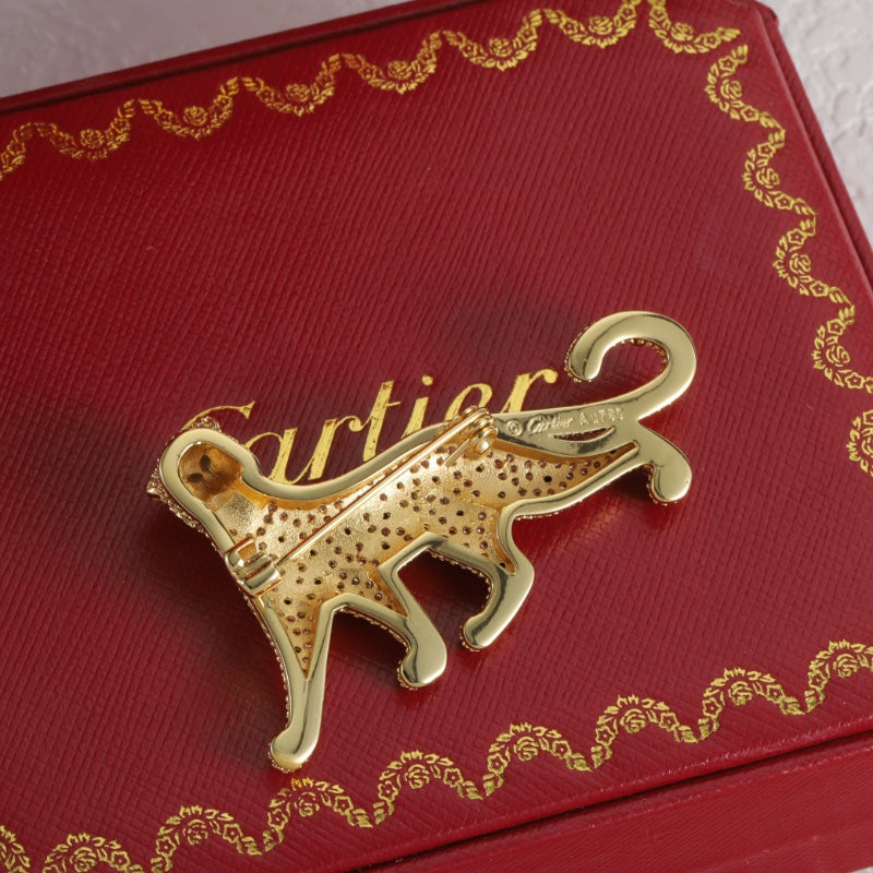 Diamond-encrusted leopard brooch