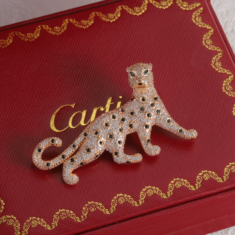 Diamond-encrusted leopard brooch
