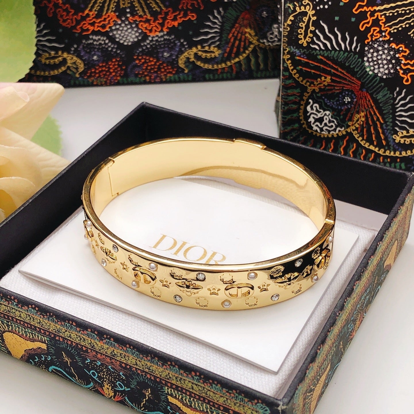 Bee engraved pearl and diamond bracelet