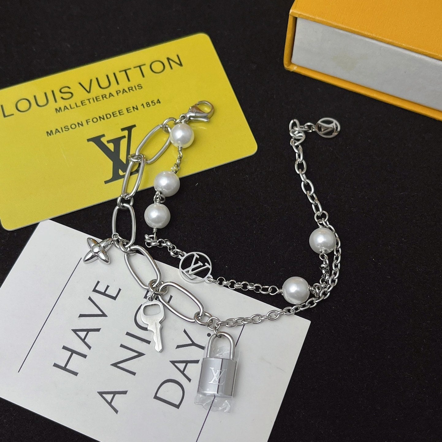 Floral lock pendant silver bracelet