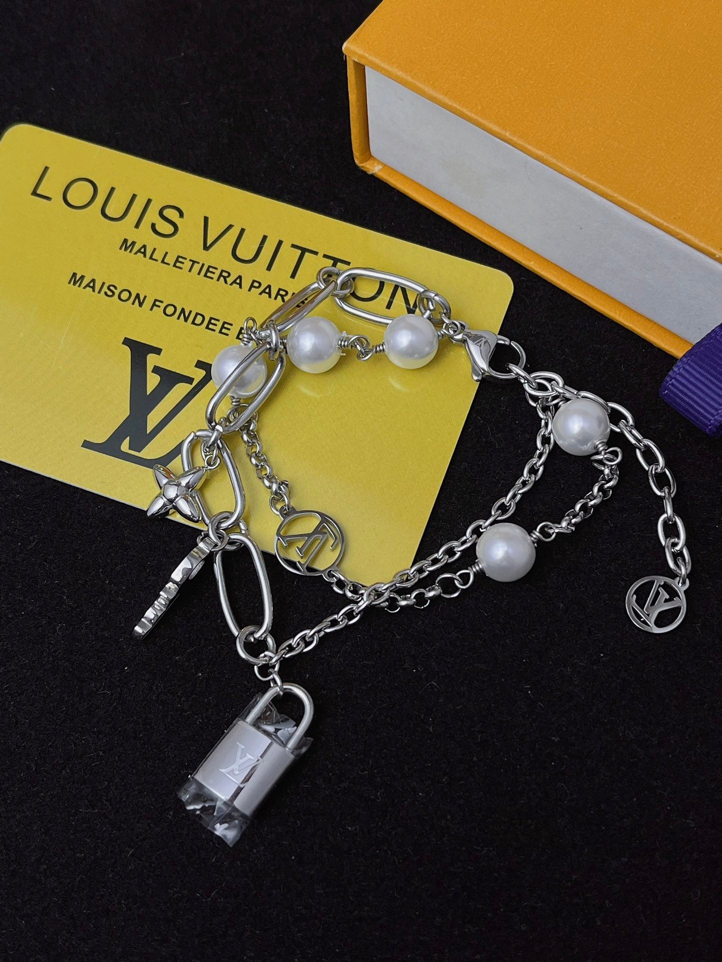 Floral lock pendant silver bracelet