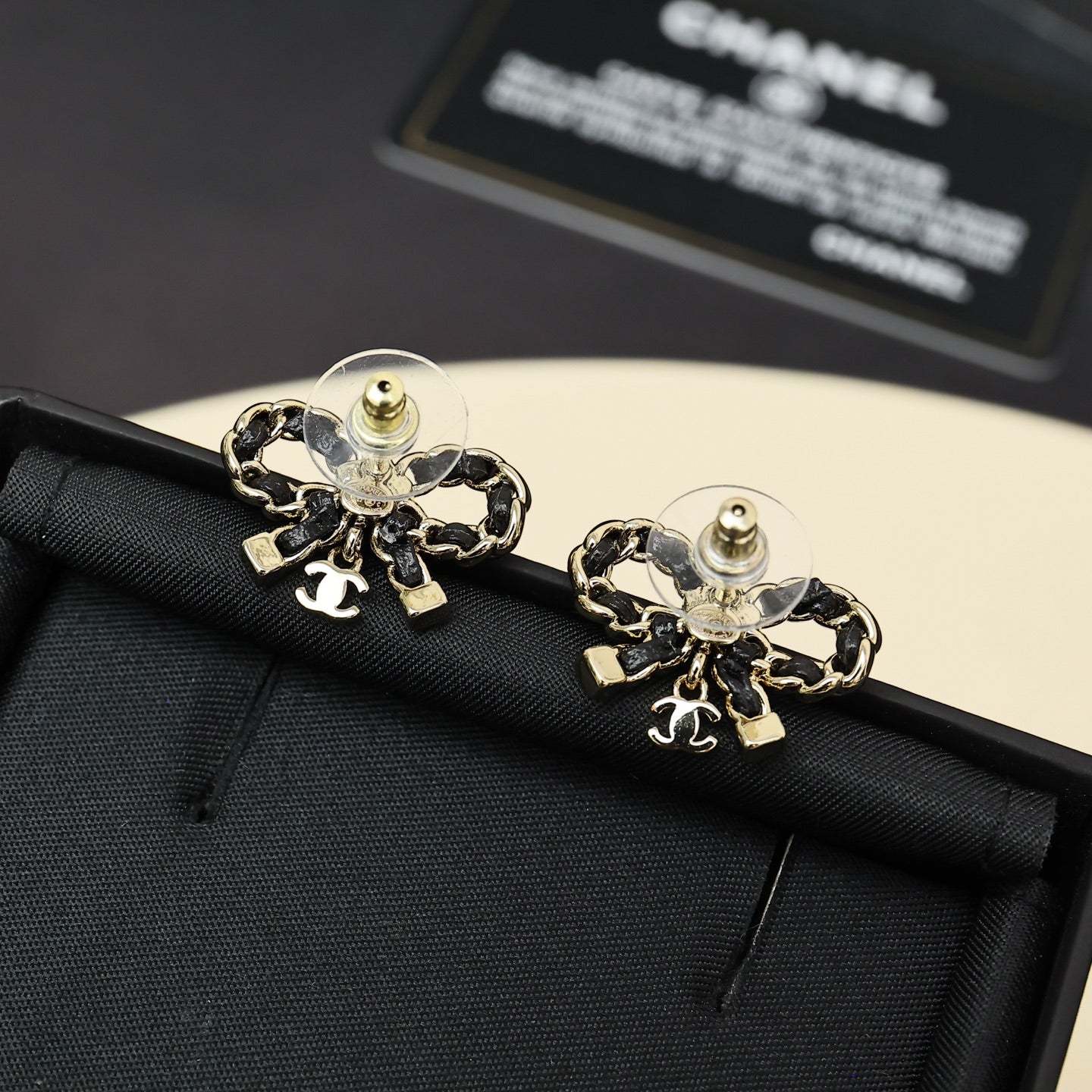 Leather chain bow star earrings