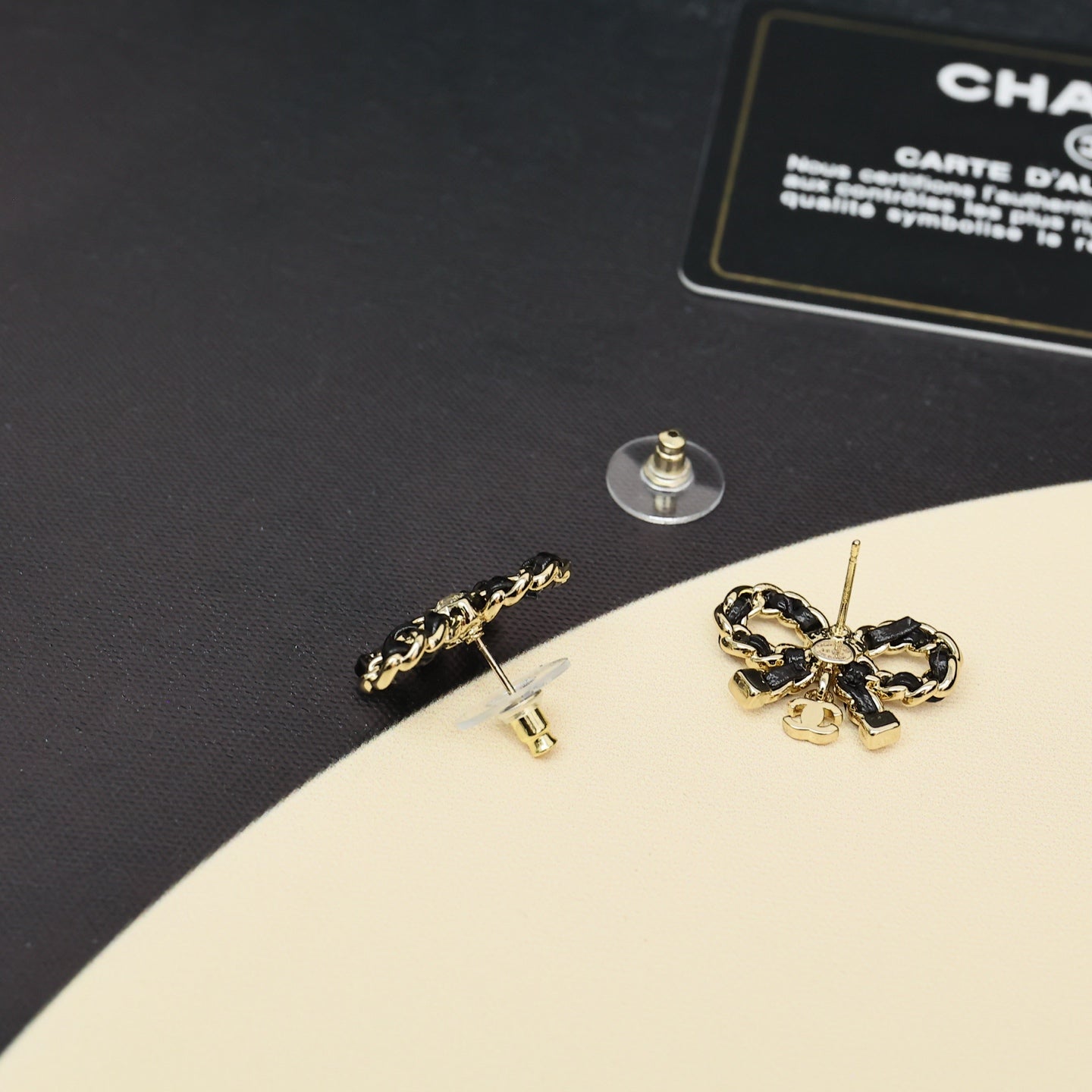 Leather chain bow star earrings